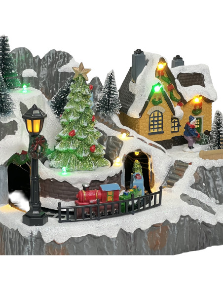 Casa navidad con luz y sonido patines 23cm