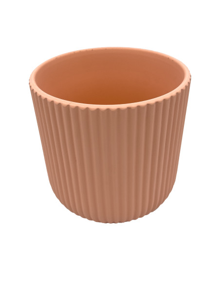 Compra Macetero cerámica 14cm ranurado rosa pálido en DKO Home. Diseño decorativo, moderno y funcional para tu hogar. ¡Envío ráp