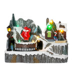 Casa navidad con luz y sonido 23cm pascuero
