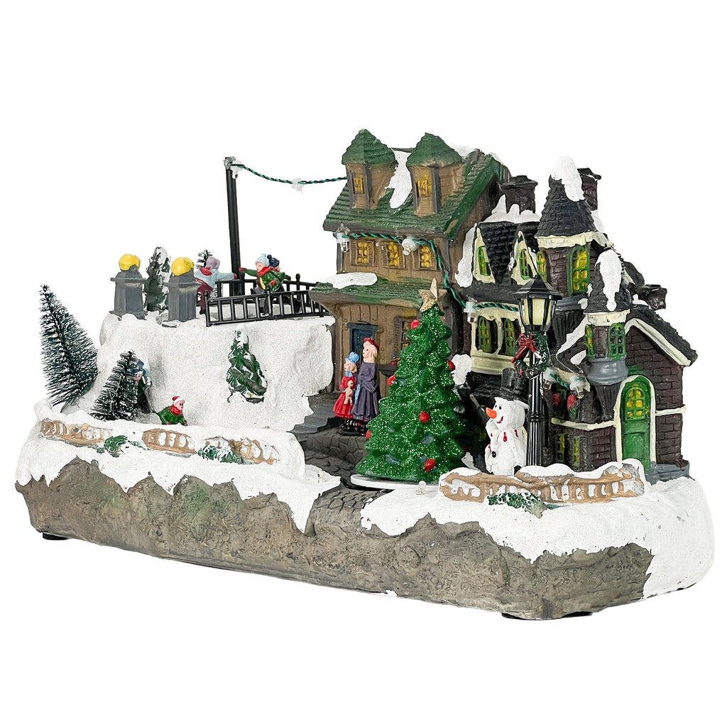 Casa navidad musical c/luz 37,5x18x20,5cm lineas tren