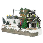Casa navidad musical c/luz 37,5x18x20,5cm lineas tren
