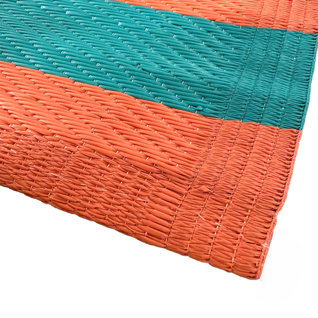 Alfombra exterior PP 150x150cm líneas coral turquesa
