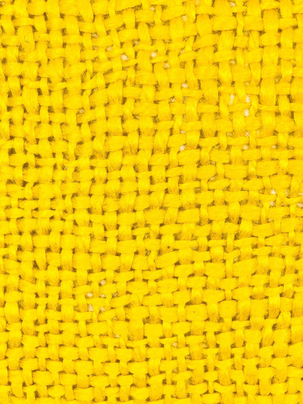 Cojín 40x40cm amarillo con borlas
